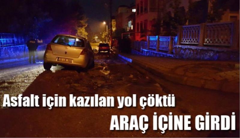 Araç çöken yola girdi 